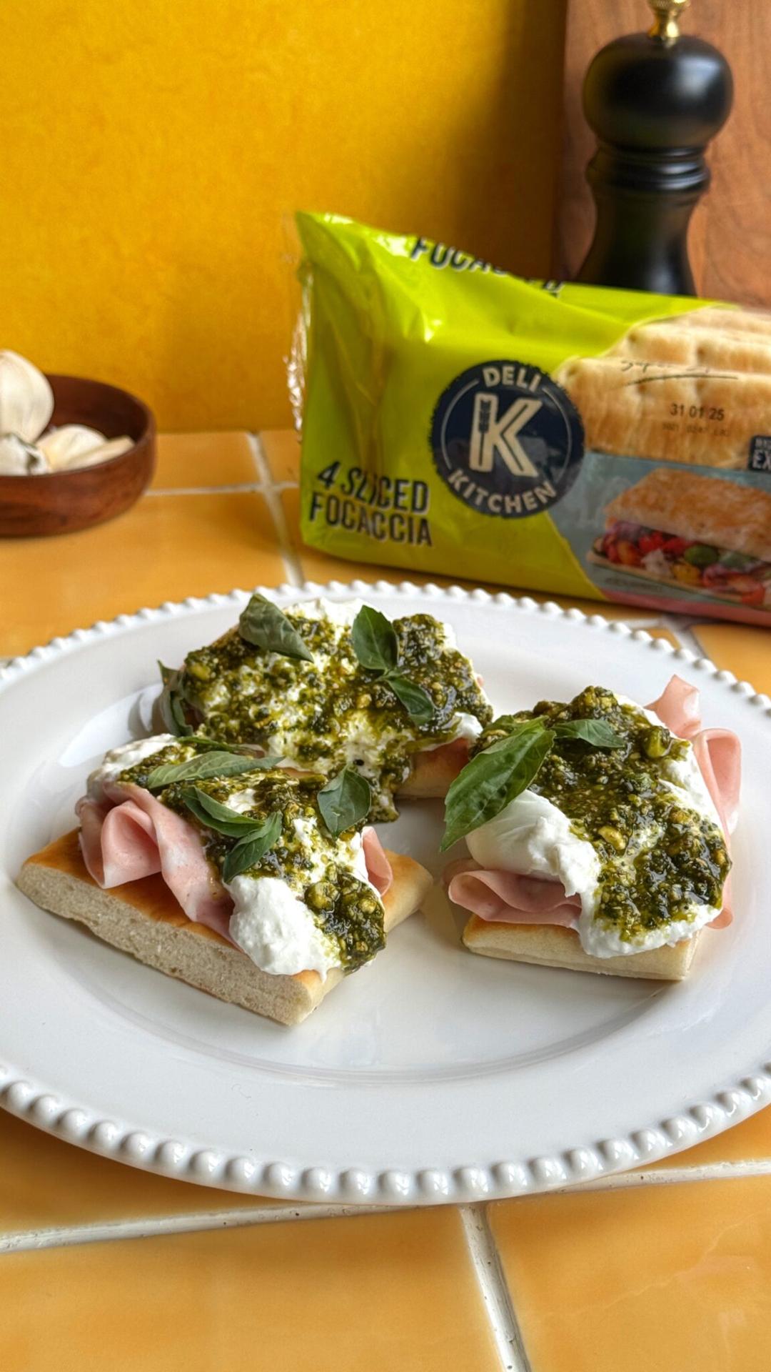 focaccia-bites-with-mortadella-burrata-pistachio-pesto-drizzle
